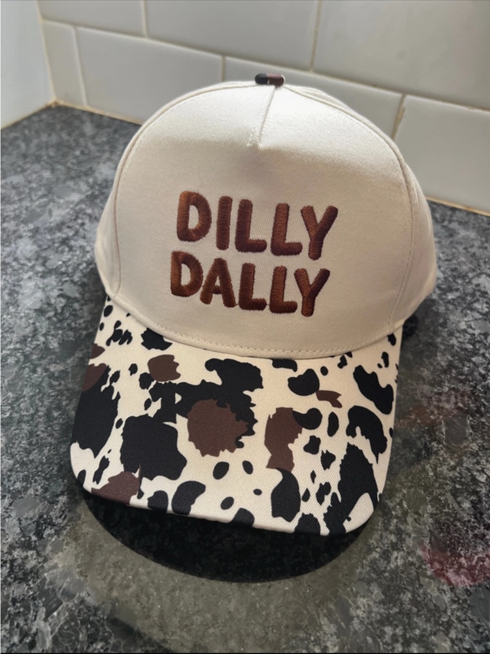 Dilly Dally women’s Cream Cap with Brown Cow Print Brim